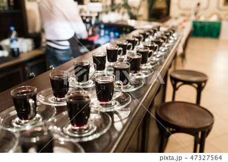 cups of coffee standing at the bar cups of coffee standing at the bar 47327564