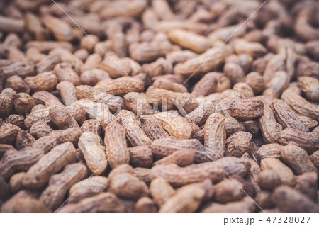 Texture of many peanuts are dried in the sun. 47328027