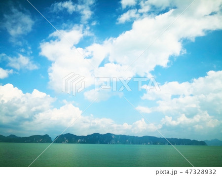 The backdrop of  the foggy island. 47328932