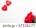 Present gift with red rose flower and heart shape 47329177