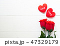 Present gift with red rose flower and heart shape 47329179