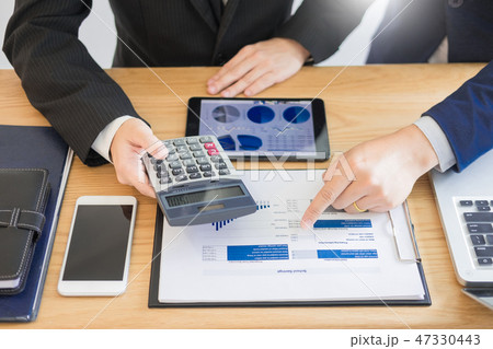 Team work business working discussing a new financial plan with Team work business working discussing a new financial plan with 47330443