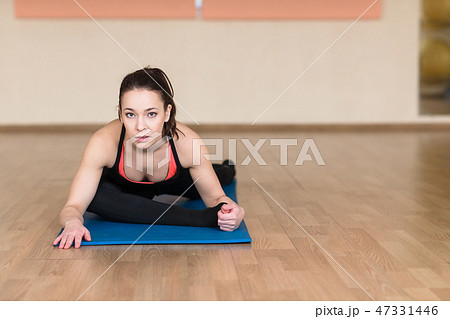 woman yoga, Bhekasana, Frog Pose in gym 47331446