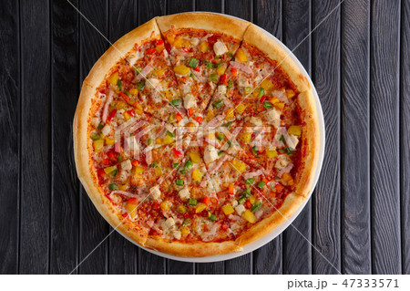 Pizza with ground-meat and vegetables 47333571