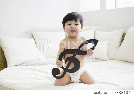 Little two cute babies photo. Baby wearing diaper in white bedroom. 221 47338184