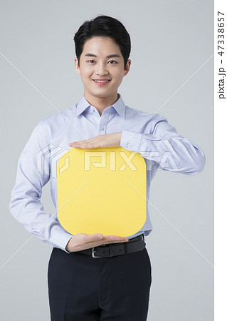 Portrait of a confident businessman' various gestures over gray background 012 Portrait of a confident businessman' various gestures over gray background 012 47338657