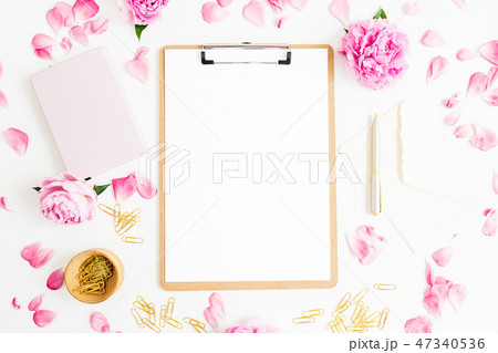 Work place with clipboard, pastel flowers 47340536