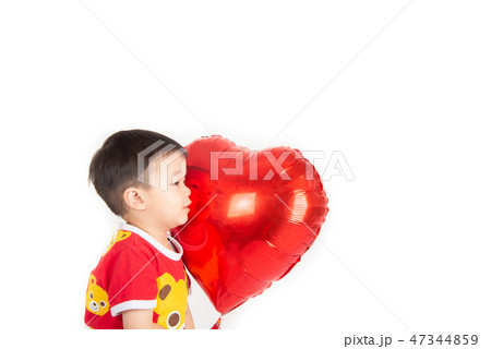 Boy sibling with balloon heart shape of love Boy sibling with balloon heart shape of love 47344859