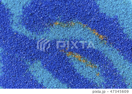 Layered colorful sand pattern. Marble style background. Blue and gold powder texture. Layered colorful sand pattern. Marble style background. Blue and gold powder texture. 47345609
