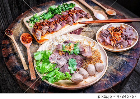 Thai noodle with sliced beef, beef meatballs on bi Thai noodle with sliced beef, beef meatballs on bi 47345767