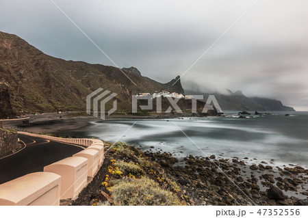 Almaciga village on rocky coastline during stormy Almaciga village on rocky coastline during stormy 47352556