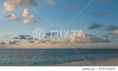 beautiful evening sky above ocean - beach seascape 47353026