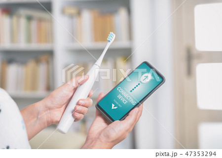 Connecting sonic toothbrush with smart phone app Connecting sonic toothbrush with smart phone app 47353294