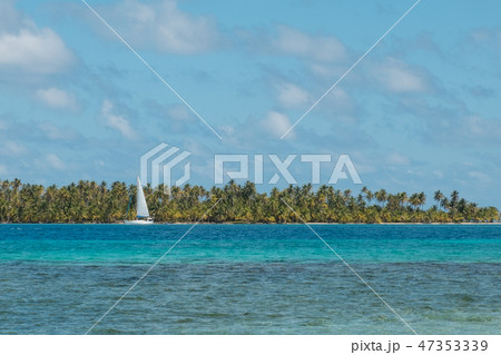sailing boat on ocean island beach with palm trees sailing boat on ocean island beach with palm trees 47353339