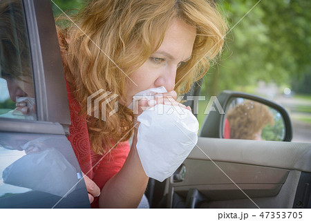 Woman suffering from motion sickness 47353705