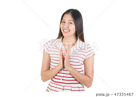 Happy asian young woman smiling and applauding. 47355467