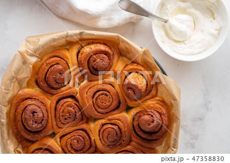 Sweet homemade cinnamon rolls. Top view. Sweet homemade cinnamon rolls. Top view. 47358830