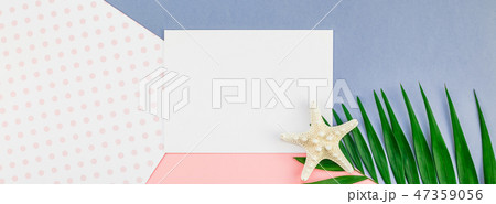Palm leaves blank paper postcard mockup Palm leaves blank paper postcard mockup 47359056