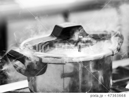 Pressure cooker steam over cooking in a Kitchen 47363668