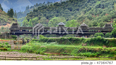 Old wooden bridge with a roof and walls, Guangxi 47364767