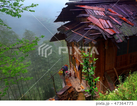 Peasant House with a wet roof, on brink 47364775