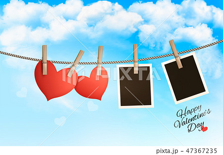 Holiday background with a red paper hearts 47367235