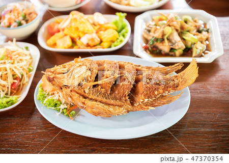 Fired fish with other delicious Thai foods 47370354