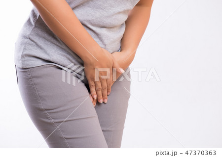 Young woman having painful stomachache Young woman having painful stomachache 47370363