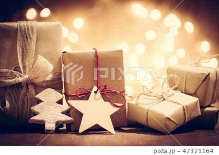 Rustic retro gifts, present boxes on glitter background. Christmas time Rustic retro gifts, present boxes on glitter background. Christmas time 47371164