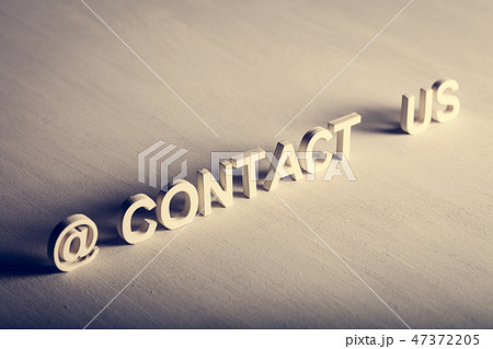 CONTACT US text made from white letters 47372205