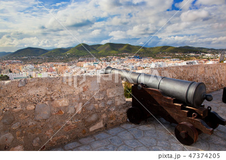 Cannon and panorama of Ibiza, Spain 47374205