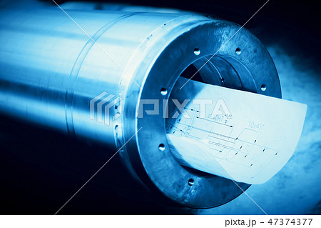 Heavy industry steel cylinder, piston with industrial plans. Heavy industry steel cylinder, piston with industrial plans. 47374377