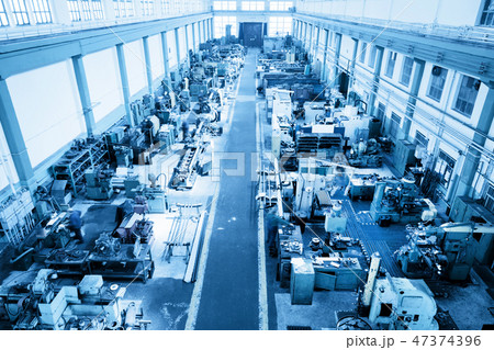 Heavy industry workshop, factory. CNC machines. Aerial view. Heavy industry workshop, factory. CNC machines. Aerial view. 47374396