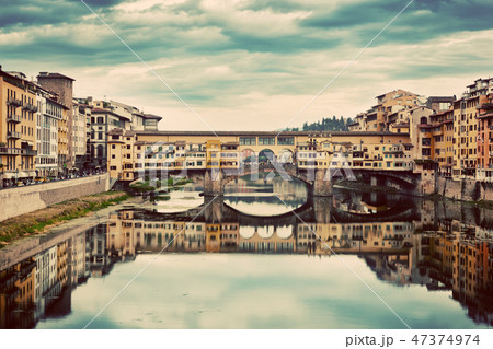 Ponte Vecchio bridge in Florence, Italy. Arno River, vintage 47374974
