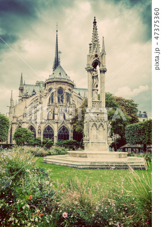 Notre Dame Cathedral in Paris, France. Square Jean XXIII. Vintage Notre Dame Cathedral in Paris, France. Square Jean XXIII. Vintage 47375360