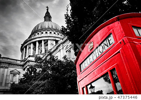 St Paul's Cathedral dome and red telephone booth. London, the UK. St Paul's Cathedral dome and red telephone booth. London, the UK. 47375446