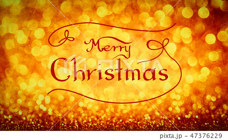 MERRY CHRISTMAS handwriting on gold background. MERRY CHRISTMAS handwriting on gold background. 47376229