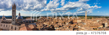 Siena, Italy panorama rooftop city view. Siena Cathedral and Mangia Tower 47376708