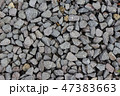 大きめの砂利を敷き詰めた背景素材 47383663
