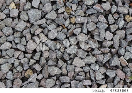 大きめの砂利を敷き詰めた背景素材の写真素材