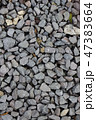 大きめの砂利を敷き詰めた背景素材 47383664