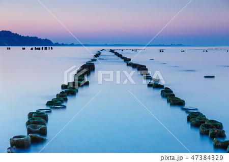 Beautiful and tranquil sunset over the sea Beautiful and tranquil sunset over the sea 47384329