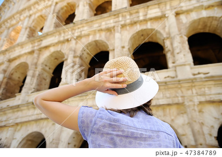 Female traveler looking on Colosseum in Rome. Female traveler looking on Colosseum in Rome. 47384789