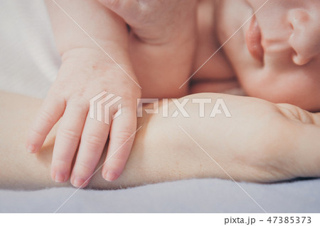 hand's of newborn baby close up on hand's of newborn baby close up on 47385373