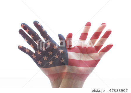 USA public holiday flag pattern on hands in eagle 47388907