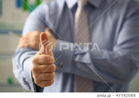 Male arm show OK or confirm during conference 47392089