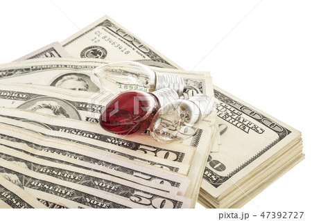 lightbulbs on American Dollars isolated on white lightbulbs on American Dollars isolated on white 47392727