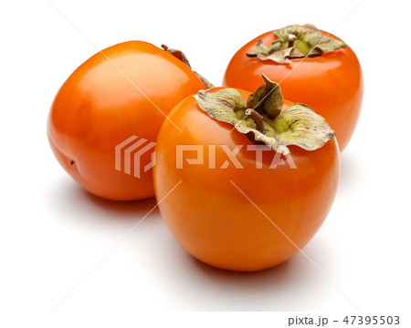 Whole persimmon fruits on white background Whole persimmon fruits on white background 47395503