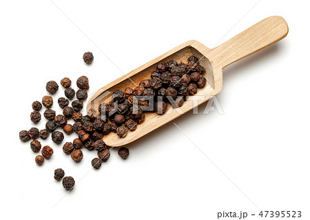 Black Peppercorn and wooden spoon Black Peppercorn and wooden spoon 47395523