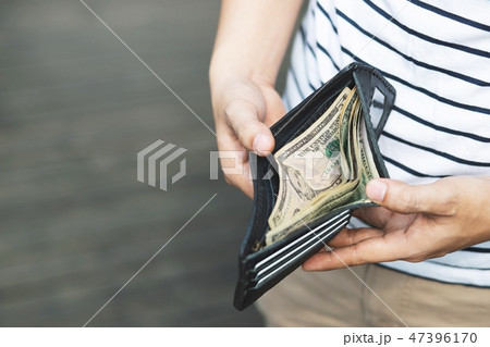 close up Businessman Person holding an wallet close up Businessman Person holding an wallet 47396170
